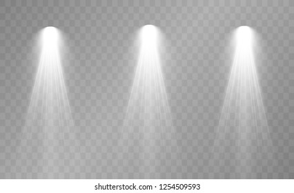 Spotlight. Rays of light isolated on transparent background. Sun flash. Vector illustration