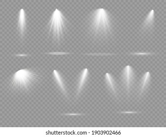 The spotlight shines on the stage. light exclusive use lens flash light effect. light from a lamp or spotlight. lighted scene. podium under the spotlight.