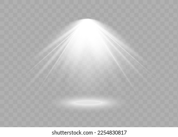 The spotlight shines on the stage. light exclusive use lens flash light effect. light from a lamp or spotlight. lighted scene. podium under the spotlight.
