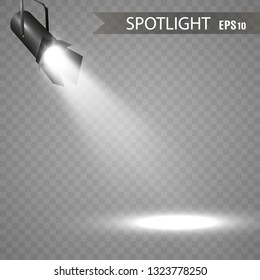 The spotlight shines on the stage.Llight from a lamp or spotlight. Lighted scene. Podium under the spotlight.