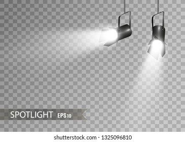The spotlight shines on the stage.Llight from a lamp or spotlight. Lighted scene. Podium under the spotlight. 
