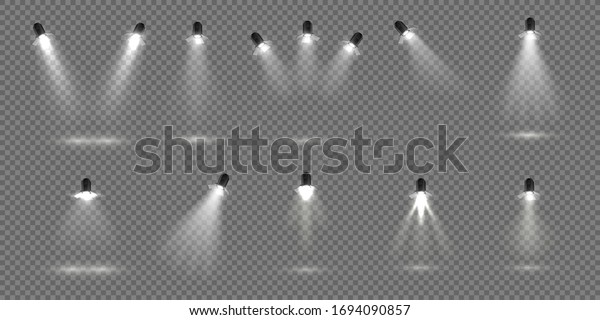Spotlight for stage. Realistic\
floodlight set. Illuminated studio spotlights for stage. Vector\
illustration stage lighting effect for theater or concert\
backdrop