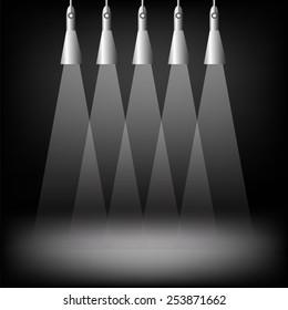 Spotlights on dark background. Place for exhibit. Abstract image of concert lighting. Graphic Design Useful For Your Design.Spotlight background with lamps.