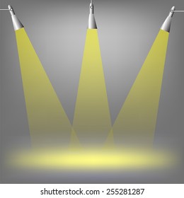 Spotlights on dark  background. Place for exhibit. Abstract image of concert lighting. Graphic Design Useful For Your Design.Spotlight background with lamps.
