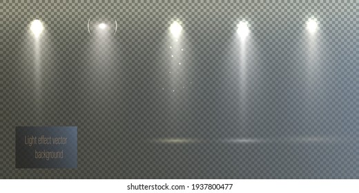 Spotlights set isolated on transparent background. Vector glowing light effect with golden rays and lens flares.	