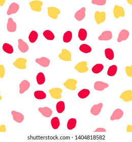 Spots blue, yellow, pink on a white background seamless pattern memphis style.