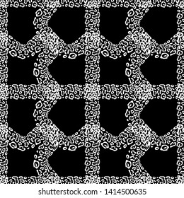 The Spots Of A Leopard. Ethnic boho seamless pattern. Black-white. Patchwork texture. Weaving. Traditional ornament. Tribal pattern. Folk motif. Can be used for wallpaper, textile, wrapping, web.
