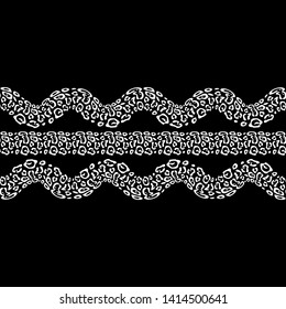 The Spots Of A Leopard. Ethnic boho seamless pattern. Black-white. Patchwork texture. Weaving. Traditional ornament. Tribal pattern. Folk motif. Can be used for wallpaper, textile, wrapping, web.