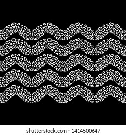 The Spots Of A Leopard. Ethnic boho seamless pattern. Black-white. Patchwork texture. Weaving. Traditional ornament. Tribal pattern. Folk motif. Can be used for wallpaper, textile, wrapping, web.