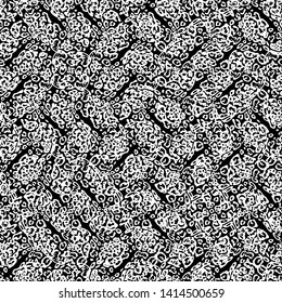 The Spots Of A Leopard. Ethnic boho seamless pattern. Black-white. Patchwork texture. Weaving. Traditional ornament. Tribal pattern. Folk motif. Can be used for wallpaper, textile, wrapping, web.