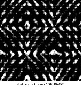 Spotted black and white grunge vector line background. Abstract halftone illustration background. Grunge grid polka dot background pattern

