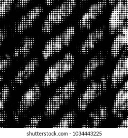 Spotted black and white grunge vector line background. Abstract halftone illustration background. Grunge grid polka dot background pattern
