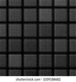 Spotted black and white grunge vector line background. Abstract halftone illustration background. Grunge grid polka dot background pattern
