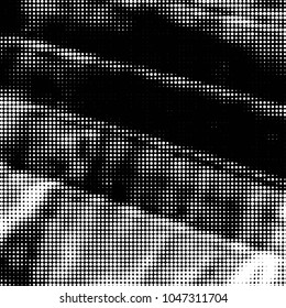 Spotted black and white grunge vector line background. Abstract halftone illustration background. Grunge grid polka dot background pattern

