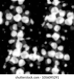 Spotted black and white grunge vector line background. Abstract halftone illustration background. Grunge grid polka dot background pattern
