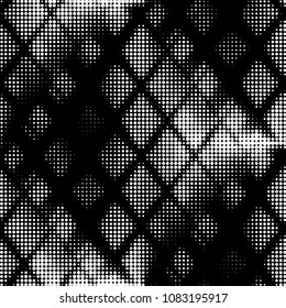 Spotted black and white grunge vector line background. Abstract halftone illustration background. Grunge grid polka dot background pattern
