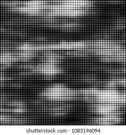 Spotted black and white grunge vector line background. Abstract halftone illustration background. Grunge grid polka dot background pattern
