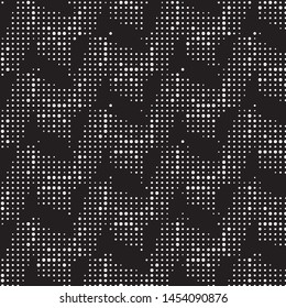 Spotted black and white grunge vector line background. Abstract halftone illustration background. Grunge grid polka dot background pattern