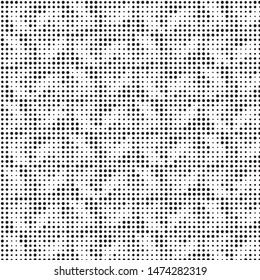 Spotted black and white grunge vector line background. Abstract halftone illustration background. Grunge grid polka dot background pattern