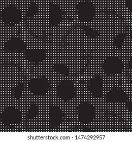 Spotted black and white grunge vector line background. Abstract halftone illustration background. Grunge grid polka dot background pattern