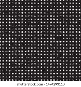 Spotted black and white grunge vector line background. Abstract halftone illustration background. Grunge grid polka dot background pattern