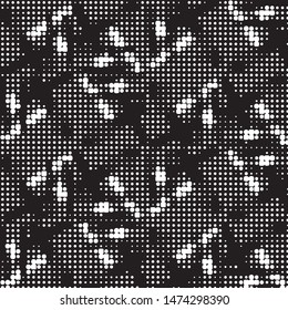 Spotted black and white grunge vector line background. Abstract halftone illustration background. Grunge grid polka dot background pattern