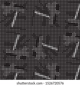 Spotted black and white grunge vector line background. Abstract halftone illustration background. Grunge grid polka dot background pattern