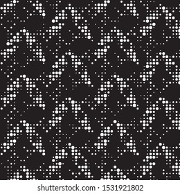 Spotted black and white grunge vector line background. Abstract halftone illustration background. Grunge grid polka dot background pattern