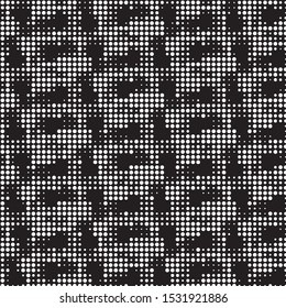 Spotted black and white grunge vector line background. Abstract halftone illustration background. Grunge grid polka dot background pattern