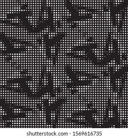 Spotted black and white grunge vector line background. Abstract halftone illustration background. Grunge grid polka dot background pattern