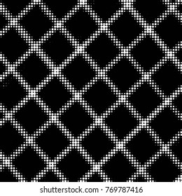 Spotted black and white grunge vector line background. Abstract halftone illustration background. Grunge grid polka dot background pattern
