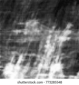 Spotted black and white grunge vector line background. Abstract halftone illustration background. Grunge grid polka dot background pattern

