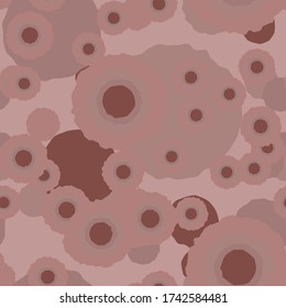 Spotted camouflage of various shades of pink, beige and brown colors. It is a colorful seamless pattern that can be used as a camo print for clothing and background and backdrop or computer wallpaper