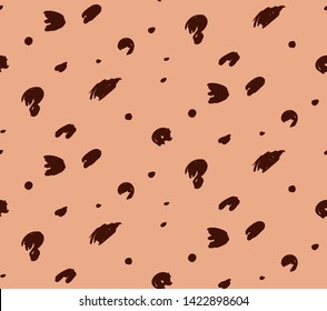 Spotted cheetah skin like pattern as abstract background.