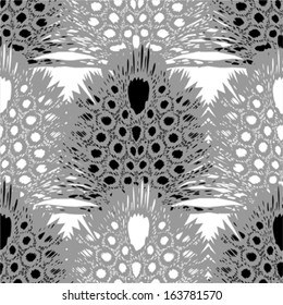 Spotted feathers seamless pattern