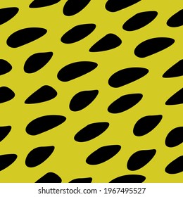 Spotted fur. Seamless yellow stained ornament. Vector.