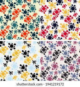 spotted seamless pattern. cartoon multicolored blots and splashes randomly arranged on a light background.Vector set of four images 