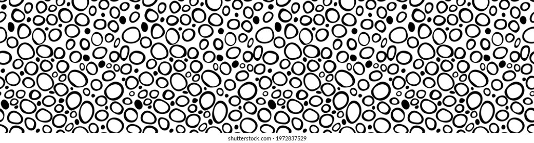 Spotty abstract vector seamless pattern. Random rings, dots, circles, spots, stains, bubbles, stones. Design for fabric, funny cute print. Irregular random texture. Repetitive graphic background