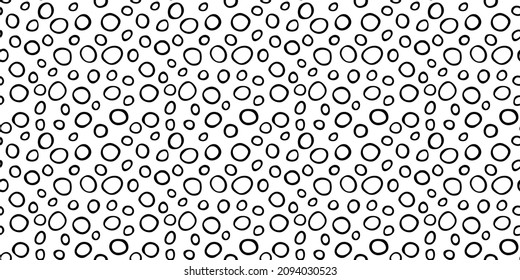 Spotty abstract vector seamless pattern. Random rings, dots, circles, spots, stains, bubbles, stones. Design for fabric, funny cute print. Irregular random texture. Repetitive graphic background