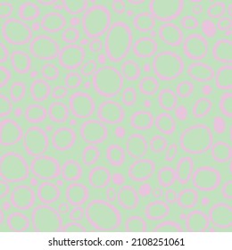 Spotty abstract vector seamless pattern. Random rings, dots, circles, spots, stains, bubbles, stones. Design for fabric, funny cute print. Irregular random texture. Repetitive graphic background