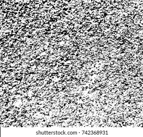 Spotty surface. White, black background.