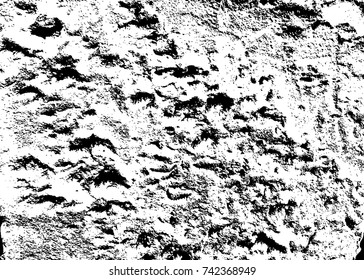Spotty surface. White, black background.