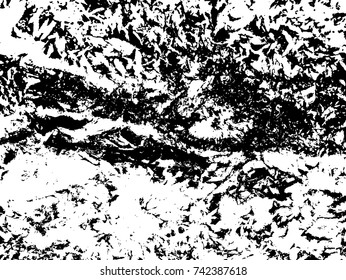 Spotty surface. White, black background.