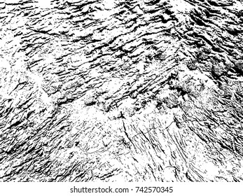 Spotty surface. White, black background.
