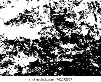 Spotty surface. White, black background.