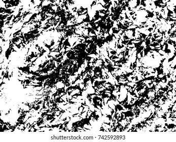 Spotty surface. White, black background.