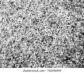Spotty surface. White, black background.