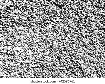 Spotty surface. White, black background.