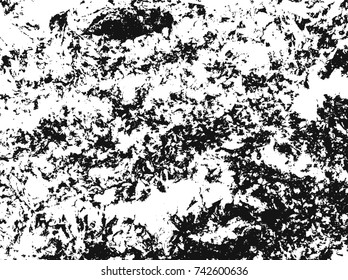 Spotty surface. White, black background.