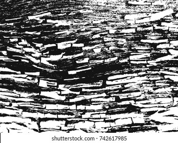 Spotty surface. White, black background.